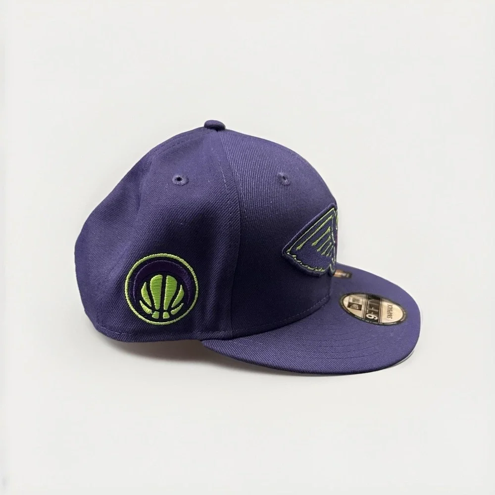 New Era New Orleans Pelicans 9FIFTY 24/25 City Edition Purple SnapBack Cap Hat